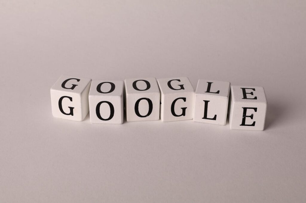 pexels-photo-15395510 White blocks with letters spelling Google, symbolizing search and SEO concepts.
